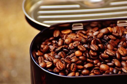 Types of Coffee Roasts, freshly roasted coffee in a container