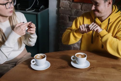 Why is Coffee Bitter, a man and a women enjoying a cup of Joe